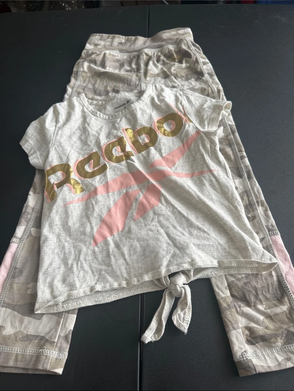 Reebok Gray Tee with Pink Logo and Gold Lettering